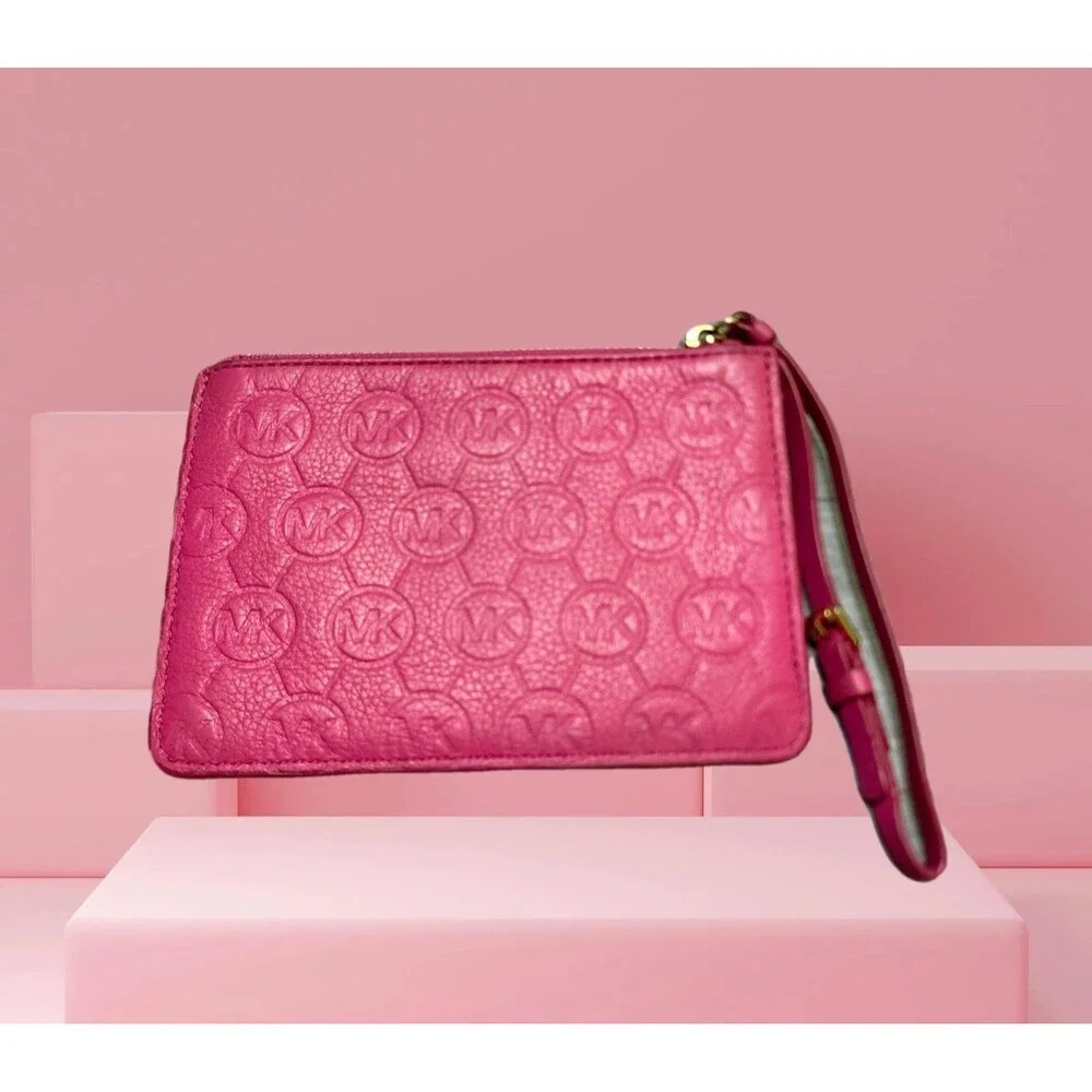 Michael Kors Fuchsia Embossed MK Logo Wristlet with Gold Accent